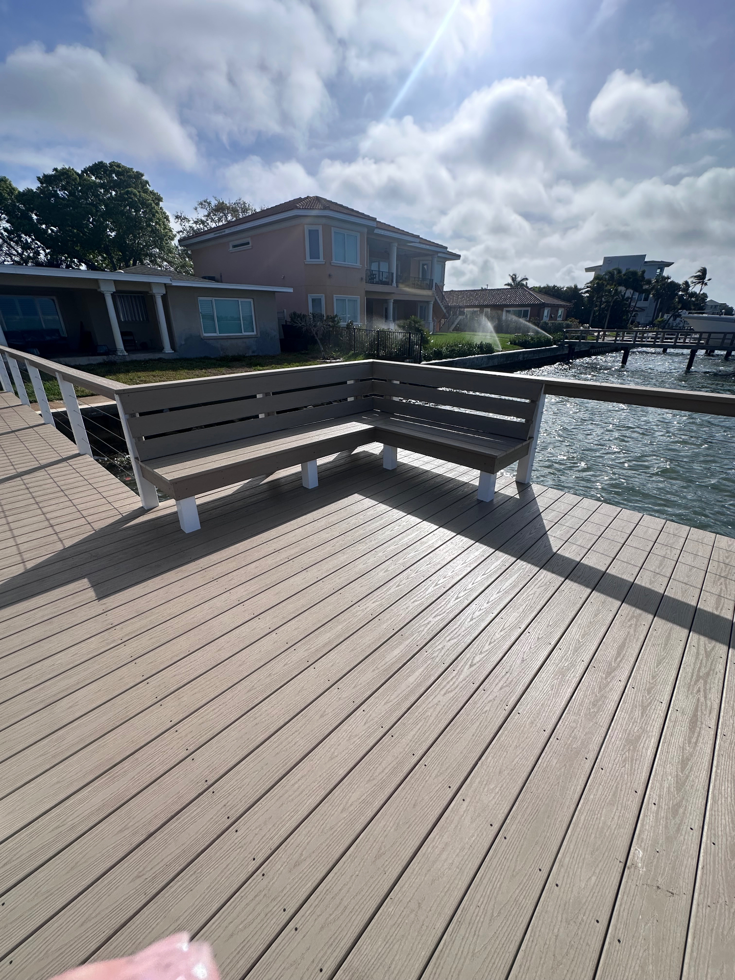 Waterfront dock with built-in bench seating
